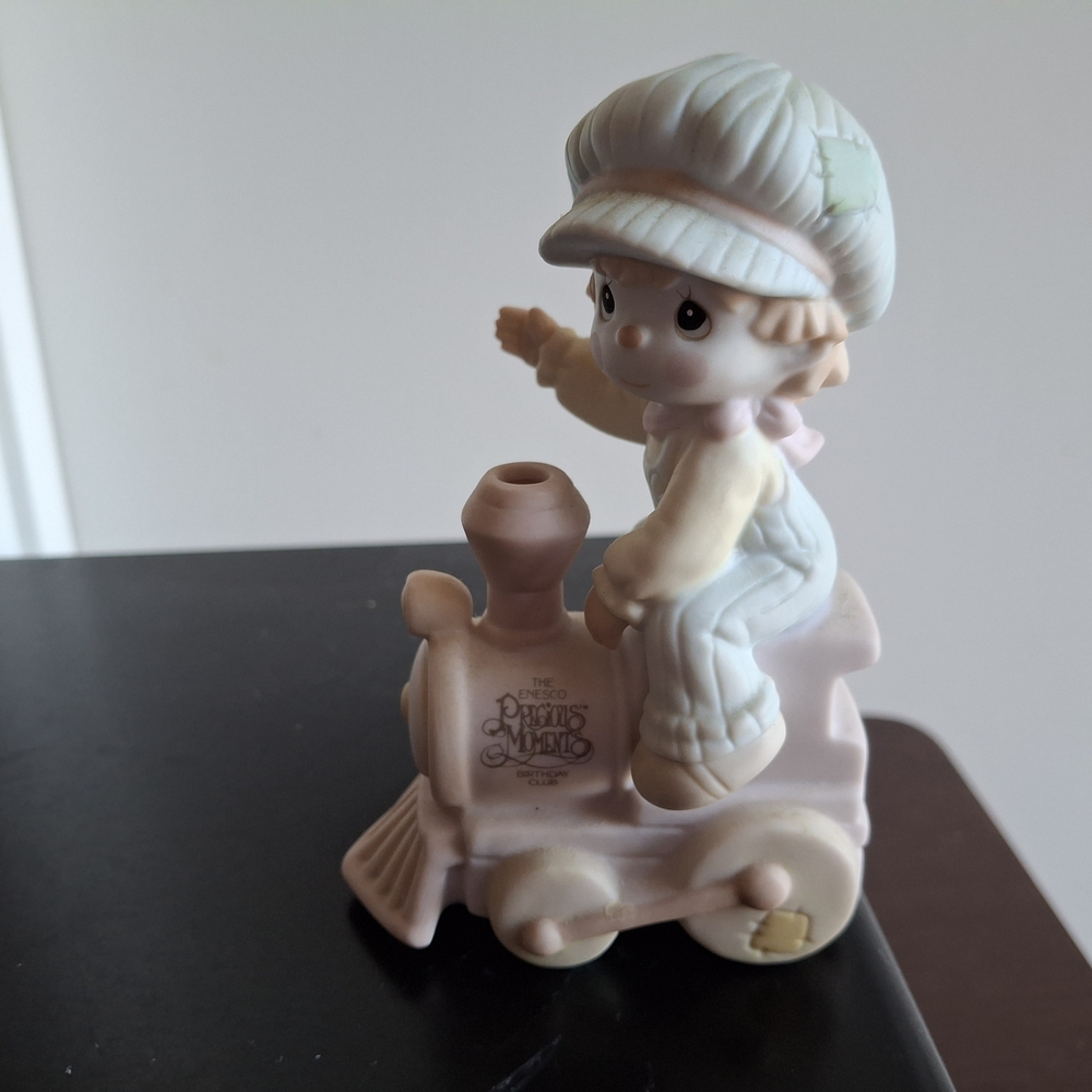 Precious Moments Figurine with Child on Train
